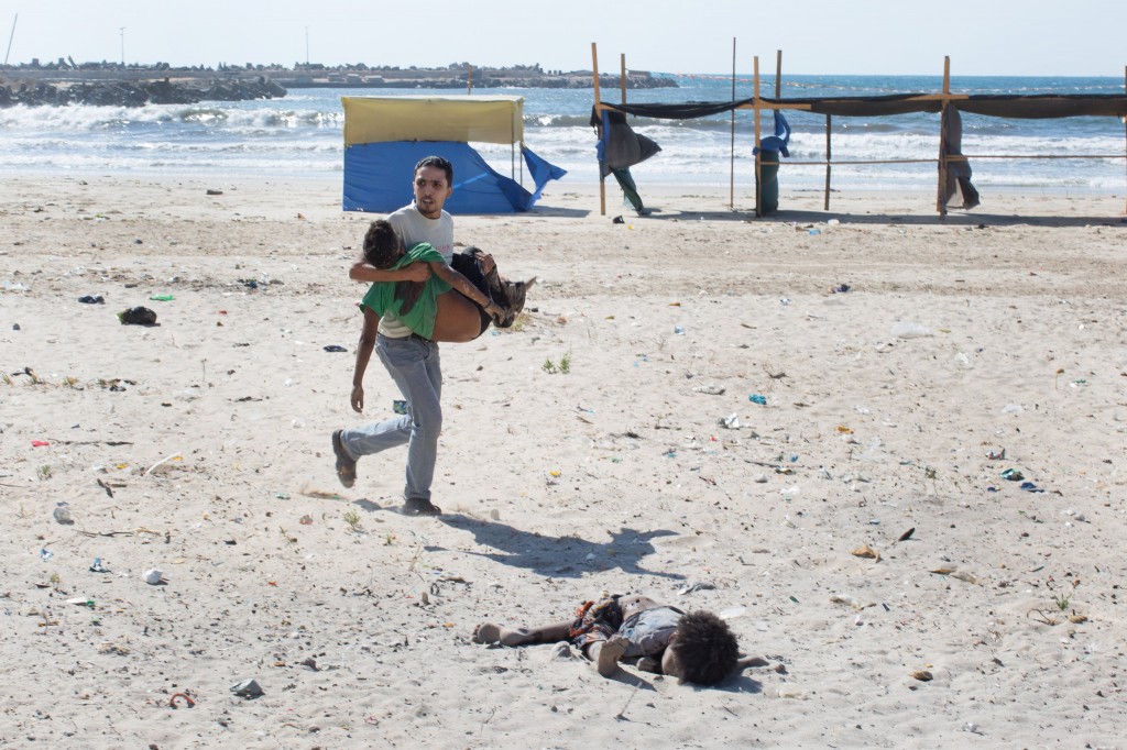 boys fleeing gaza attack - aftermath