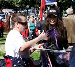 FEATURED SPEAKER: Jan Morgan, owner of The Gun Cave, right, prepares to take a selfie with Barbara Williams, of Benton, following her speech at the March 4 Trump rally Saturday morning.